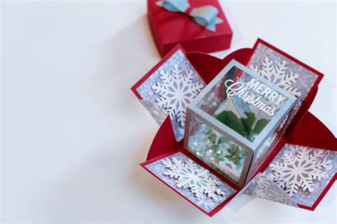 Maybe you would like to learn more about one of these? DIY Holiday Exploding Box | Cricut