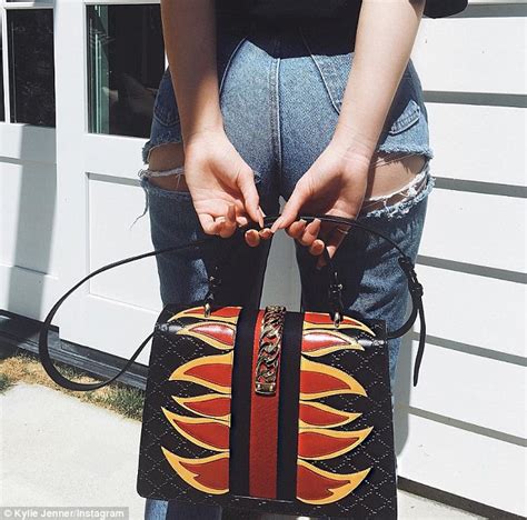 Kylie Jenner Sports Strategic Rips In Her Jeans To Expose Bare Buttocks