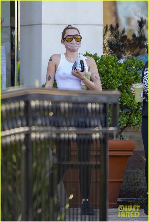 miley cyrus goes braless in see through tank top while running errands photo 4518915 miley
