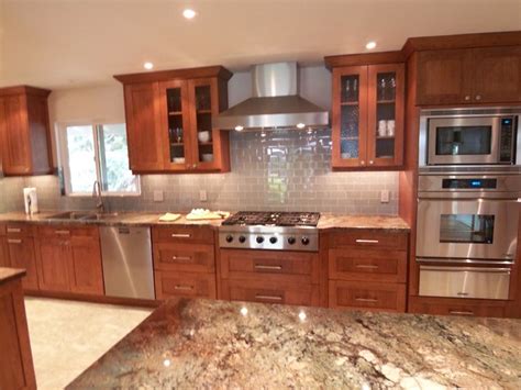Cherry kitchen cabinets are a favorite because of their warm tones and rich look. Contemporary Craftsman Cherry Kitchen - Modern - Kitchen ...