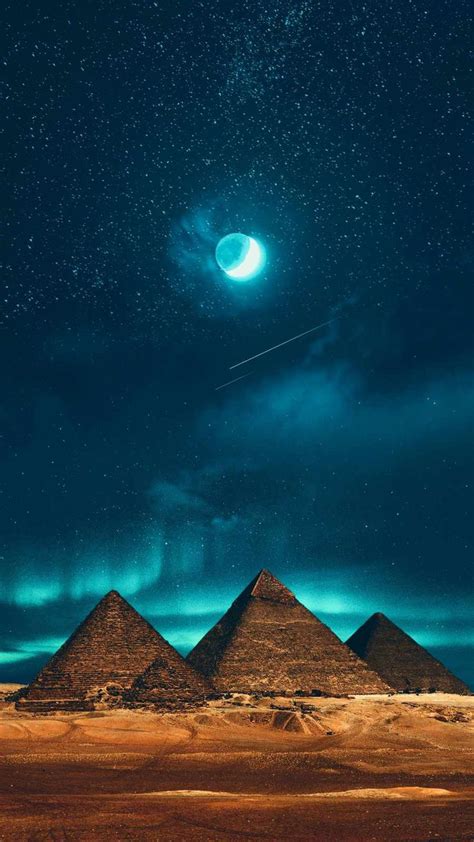 Three Pyramids Under The Night Sky With An Object In The Distance And