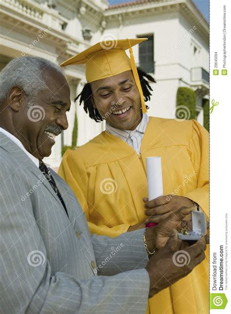 Graduate Student Receiving T From Father Stock Photo Image Of