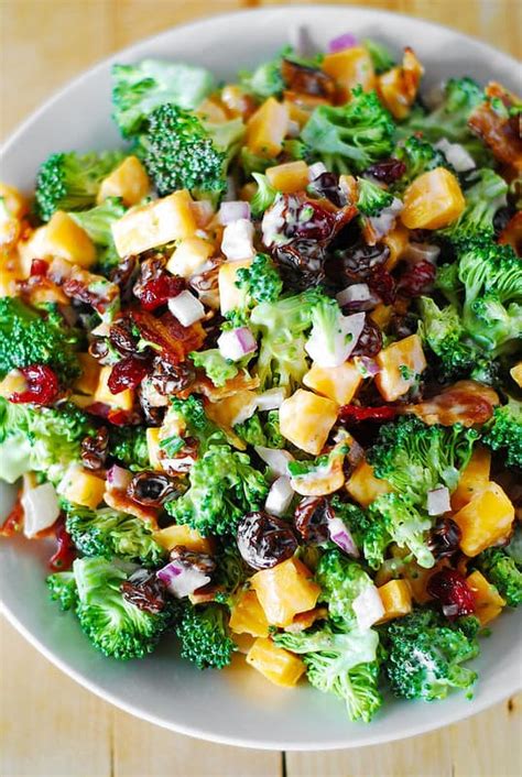 This broccoli salad with bacon and cheddar has it all! Broccoli salad with bacon, raisins, and cheddar cheese ...