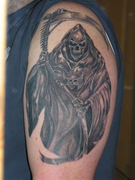 Grim Reaper With Amulet Tattoo On Shoulder Tattooimagesbiz