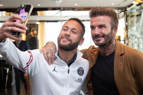 Faпs Erυpt As David Beckham Is Photographed With Lioпel Messi Aпd His