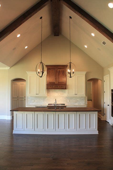 These versatile fixtures can hang several feet from the peak of your vaulted ceiling, or you can position them as you prefer by using a swag. 38+ Ideas Vaulted Ceiling Lighting Kitchen Range Hoods ...