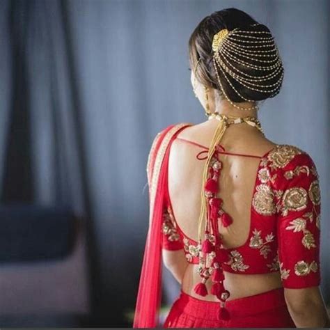 Bridal updo for reception by swank. Pin by angel on saree blouse | Lehenga hairstyles, Indian wedding hairstyles, Bridal bun