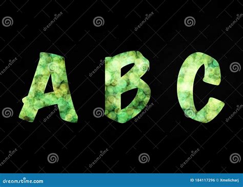 Green Abstract Abc Alphabet Letters On Black Background Stock