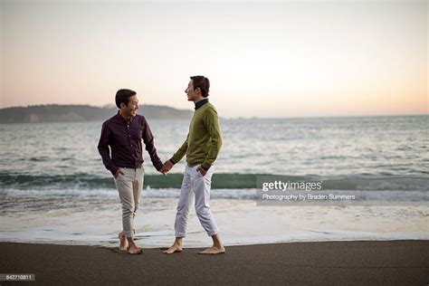 Gay Couple On San Francisco Beach Photo Getty Images