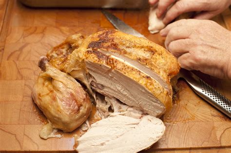 Whole Roast Chicken Sliced Through The Breast Free Stock Image