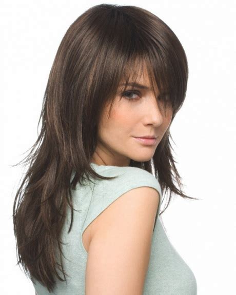 Ask your hairdresser for long layers at the back and smooth, graded layers to frame the face. Shaggy layered haircuts for long hair
