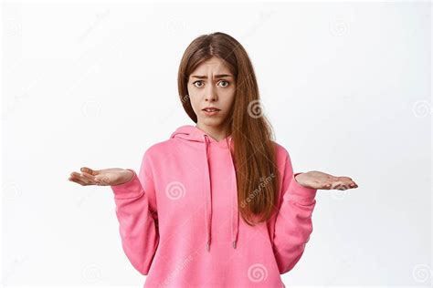 Confused Girl Cant Understand Something Shrugging Shoulders And Spread Hands Sideways Look