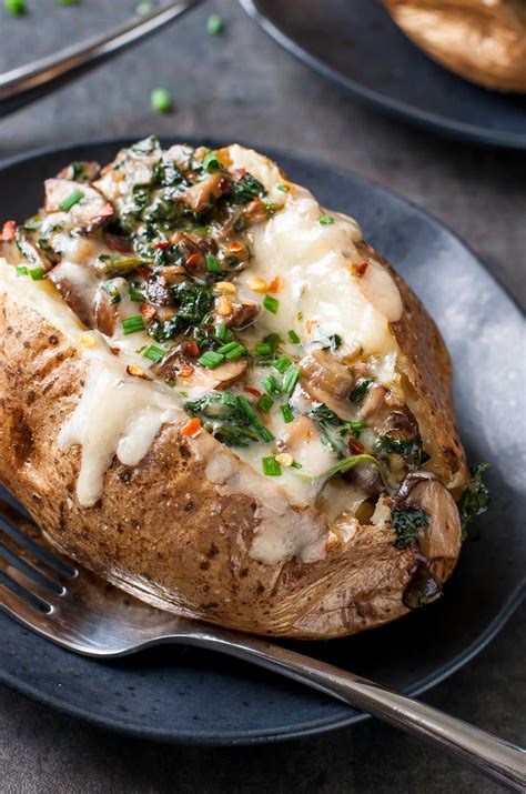 Cheesy Vegetarian Loaded Baked Potatoes With Spinach And Mushrooms
