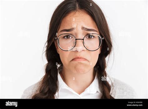 Photo Closeup Of Frustrated Upset Girl Wearing Eyeglasses Crying And Frowning With Sad Face