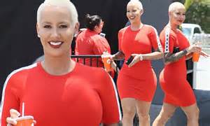 Amber Rose Highlights Her Curves In A Tight Mini Dress To Promote Her