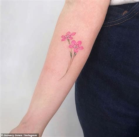 January Jones Unveils New Pink Flower Tattoo On Her Arm