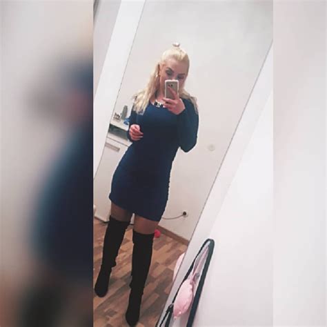 Mirror Selfie Of Black Thigh High Boots On Black Pantyhose With Short