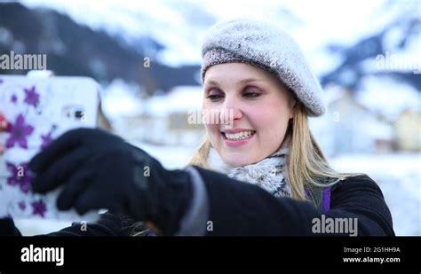 Blonde Girl Taking A Selfie Photo On The Swiss Alpine Alps Stock Video Footage Alamy