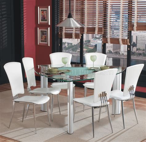 The design is both ethereal and practical: Triangle Glass Top Modern Dining Set 7Pc w/White Chairs