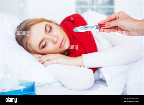 Fever And Cold Portrait Of Beautiful Woman Caught Flu Having Headache And High Temperature