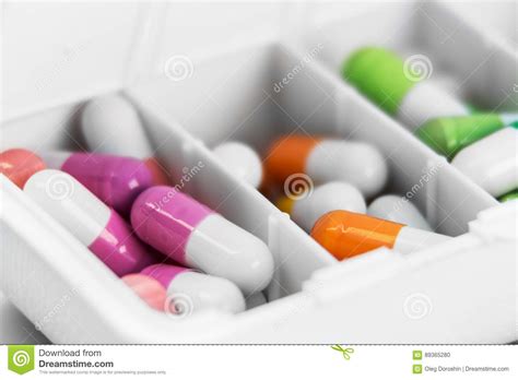 Different Colors Of The Pill In A Plastic Box Stock Photo Image Of