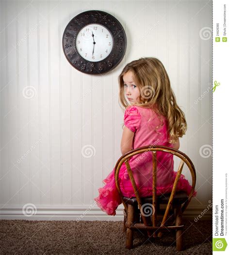 Little Girl In Time Out Or In Trouble Looking Stock Photo