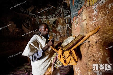 Priest Of The Ethiopian Orthodox Church Reading The Bible Inside Abuna