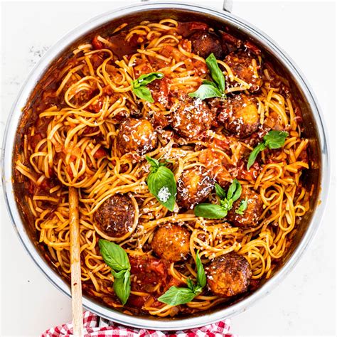 Place meatballs on a rack in a shallow baking pan. Easy chicken meatballs with pasta - Simply Delicious