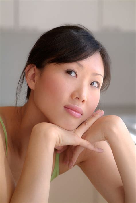 Close Up Portrait Of Pretty Asian Woman Looking Skyward Pierre Arsenault Photo