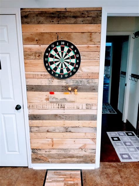 We were going for an arcade feel to our basement (i'm op's brother) so we wanted a few cabinets. Fun pallet, dart board wall. Man cave decor. | Game room ...