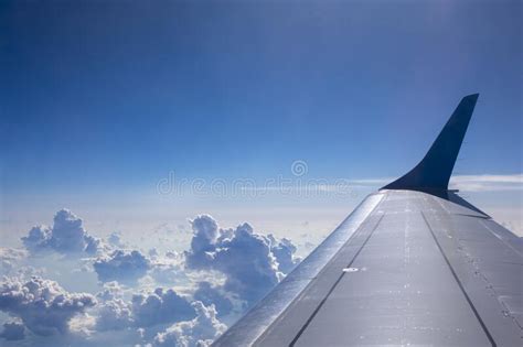 Plane Wing On A Blue Sky Cloudy Background Stock Image Image Of Sunny