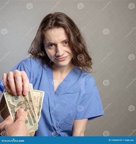 Greedy Doctor taking cash stock image. Image of compensation - 139463157