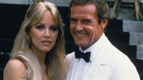 File Actor Roger Moore Right Poses With His Co Star Tanya Roberts From The James Bond Film