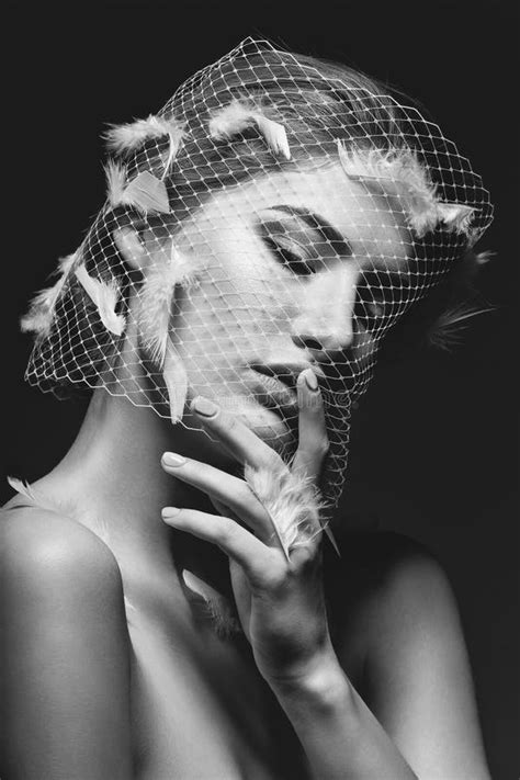 beautiful girl in veil with feathers stock image image of female fashion 83423027