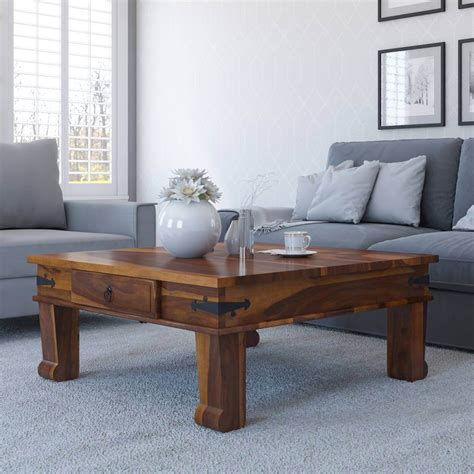 The larger the furniture, the larger your coffee table should be. Solid Wood Square Drawer Coffee Table
