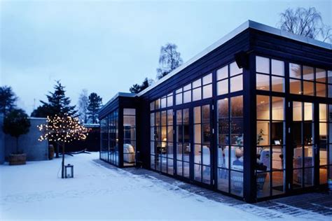 Metal Glass And Wood Homes In Snow Modern House Designs