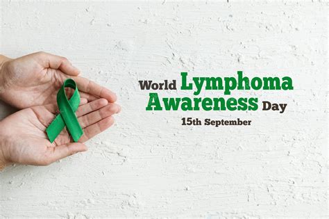 Premium Photo World Lymphoma Awareness Day Woman Hands Holds Green