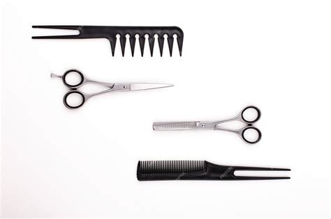 Free Photo Scissors And Combs For Hair Cut And Treatment Lie On A