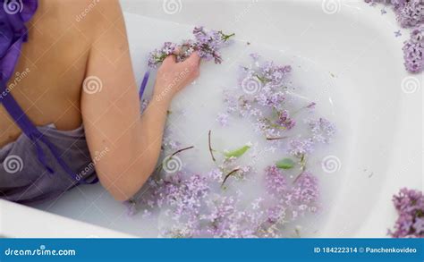 Beautiful Healthy Woman Lies In A Milk Bath Stock Footage Video Of Glamour Lilac 184222314