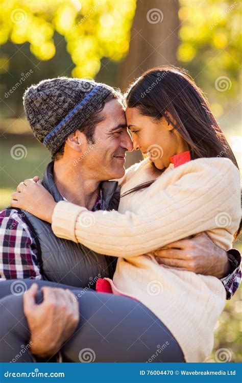 Man Carrying Woman At Park Stock Photo Image Of Female 76004470