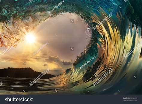 Beautiful Ocean Surfing Wave Sunset Beach Stock Photo