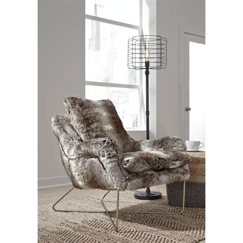 The design of soft faux fur upholstery makes you have a warm and comfortable seating experience even if in the cold winter. Signature Design by Ashley Wildau Faux Fur Accent Chair ...