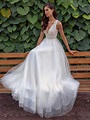 A-line wedding dress with a deep V-neckline lace bodice and illusion back