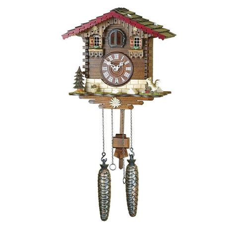 A Cuckoo Clock With Two Fish Hanging From Its Sides And A Red Roof