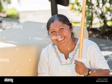 Smiling Beautiful Mexican Woman Housekeeper At A Resort In Mexico