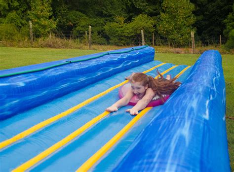 Foot Long Giant Inflatable Water Slip And Slide Affordable Moonwalk Rentals Covington