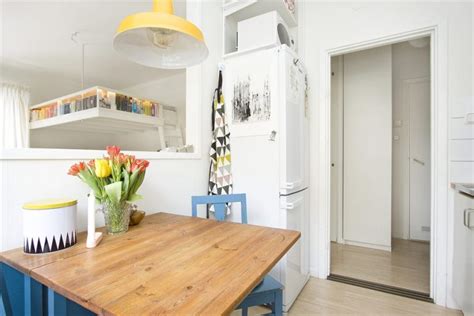 Small Swedish Studio Apartment Elegantly Combines Loft Bed And Book