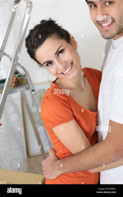 Attractive Couple Moving Into New Home Stock Photo Alamy