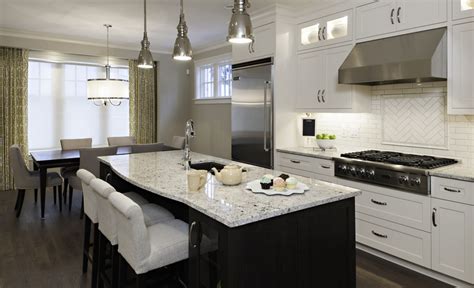 White Kitchen With Dark Wood And Hardwood Floors Calgary Kentwood