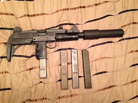 Uc 9 9mm Uzi Semi Auto W Folding Stock And 1 25 And 1 32 Round Mag